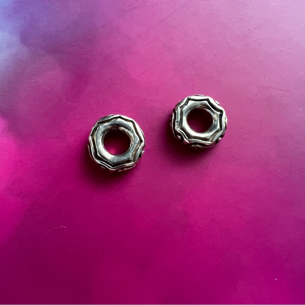 Two sterling silver donuts